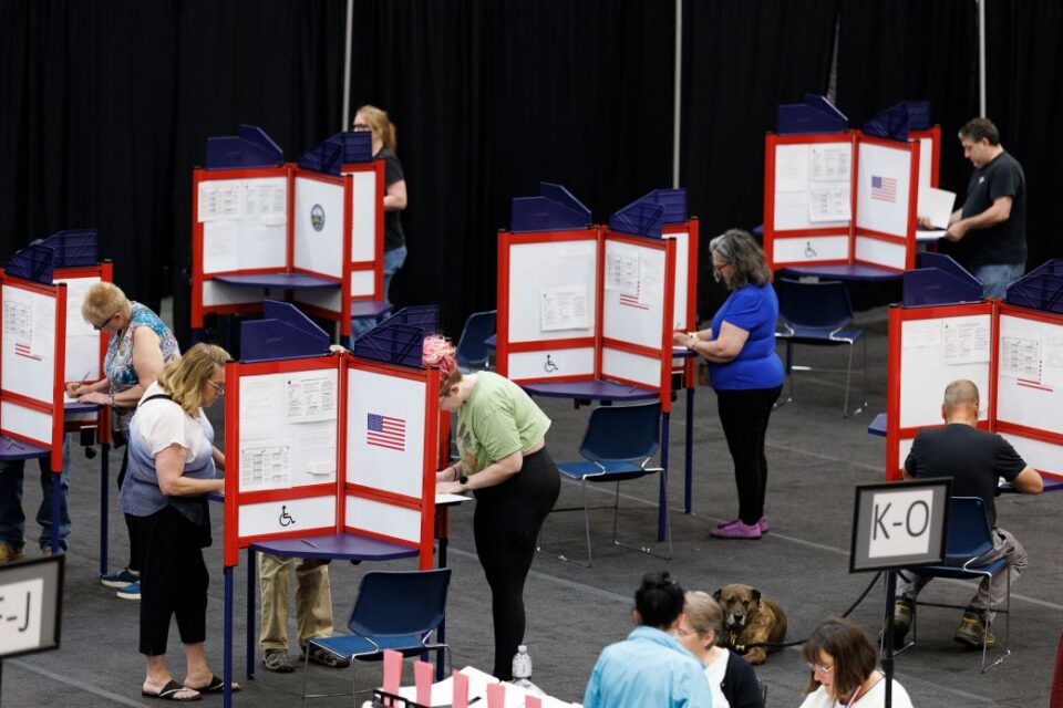 People cast their ballots at a polling station in Augusta, Maine, on June 9.