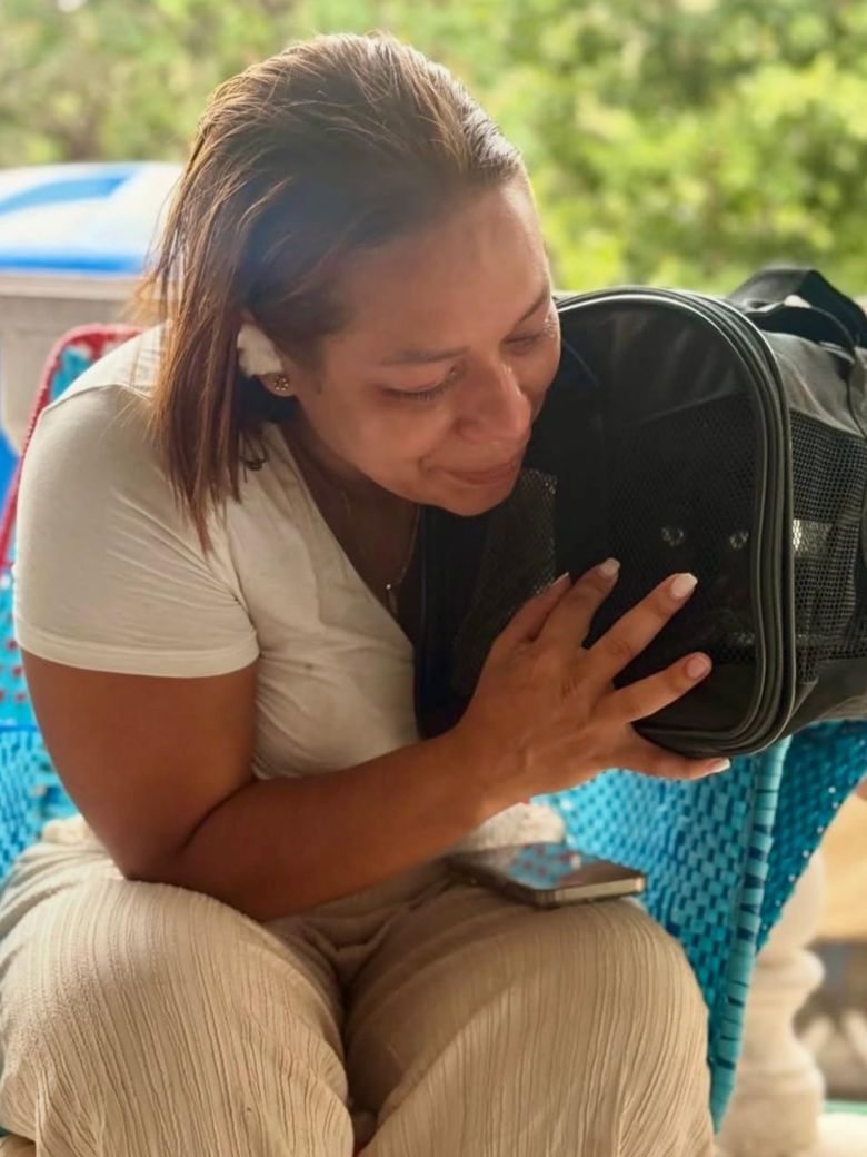 Rofredbelys was reunited with her cat, Gus, who had been rescued by Maria Cordova's shelter.