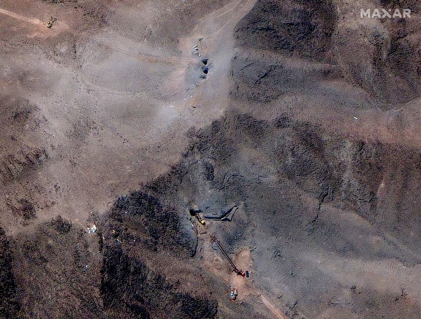 02-closer-view-of-activity Satellite images of Iran's Fordow Enrichment Complex on June 29, 2025, showing vehicles, excavation equipment and a crane on site.