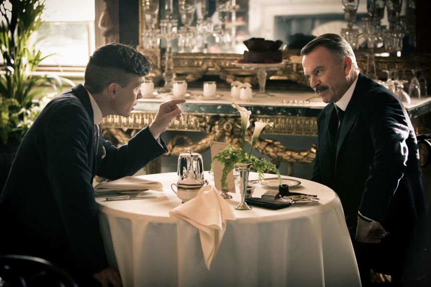 Neill in a scene from "Peaky Blinders" with Cillian Murphy.
