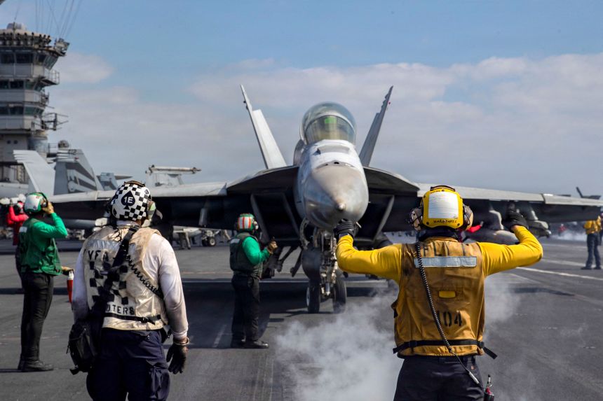 An F/A-18F Super Hornet prepares to launch from the flight deck of the Nimitz-class aircraft carrier USS Abraham Lincoln in support of the Operation Epic Fury attack on Iran from an undisclosed location March 3.