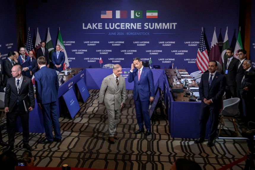 2026-06-21t160809z-1587547062-rc2dyla5axki-rtrmadp-3-iran-crisis-swiss-meeting Pakistan's Prime Minister Shehbaz Sharif and Qatar's Prime Minister Sheikh Mohammed bin Abdulrahman bin Jassim al-Thani, center, walk to their spots prior to a quadrilateral meeting between the United States, Iran and their countries at the Burgenstock luxury hotel complex overlooking Lake Lucerne, Switzerland, on June 21.