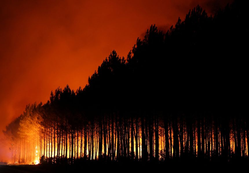 2026-07-23t005605z-1695838011-rc29jmanc5ug-rtrmadp-3-europe-weather-france-wildfire A wildfire burns in a forest area in the Gironde department on Wednesday amid worsening drought conditions following a heatwave and water shortages across much of France.