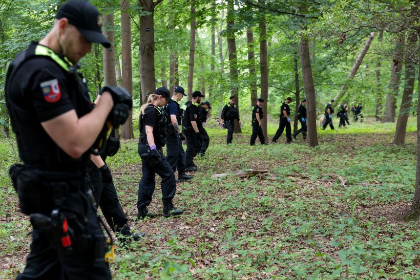 Police search a forest in Berlin after the attack at a Pride parade on Saturday evening.