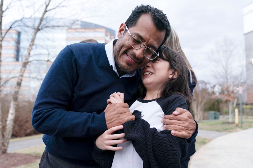230210143616-01-political-prisoners-from-nicaragua-021023 Former Nicaragua presidential candidate Felix Maradiaga hugs his daughter Alejandra, after arriving from Nicaragua at Washington Dulles International Airport, in Chantilly, Va., on Thursday, Feb. 9, 2023. Some 222 inmates considered by many to be political prisoners of the government of Nicaraguan President Daniel Ortega arrived at Washington after an apparently negotiated release. (AP Photo/Jose Luis Magana)