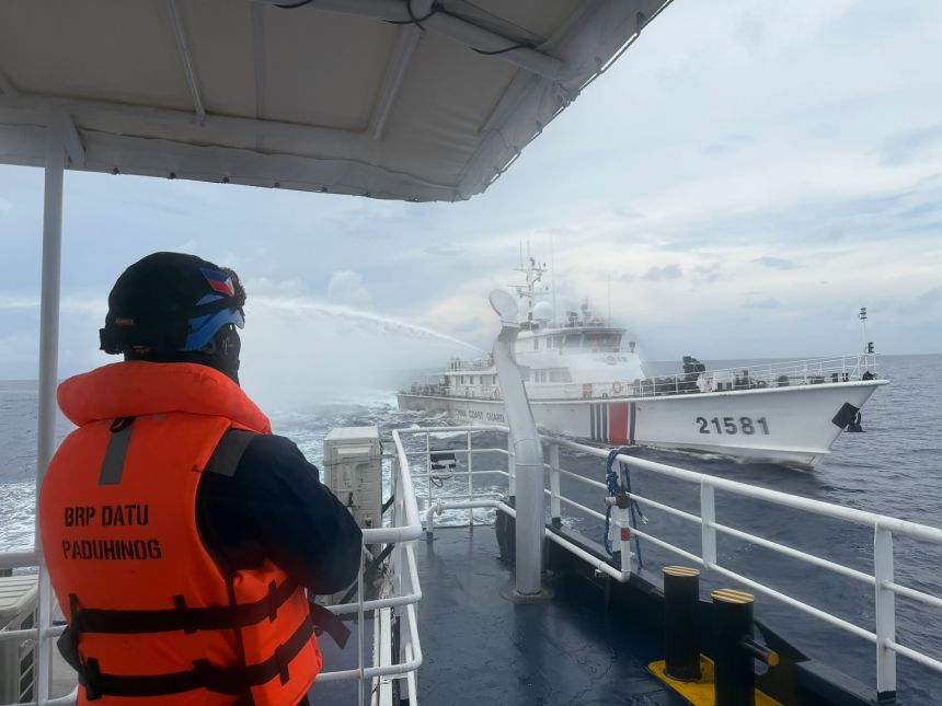 7db4e93f-6628-4fdf-8f1f-7e19bd767e61-1-102-o China Coast Guard vessel fires water cannon at a Philippine vessel near Scarborough Shoal in the South China Sea on Friday, July 24, 2026.