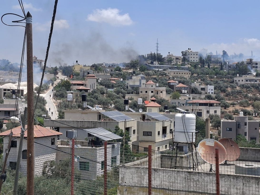 872289bd-13c1-455c-8c0c-2b118676c991 Smoke billows after settlers set fire to homes and businesses in the West Bank village of Faraata on Friday.