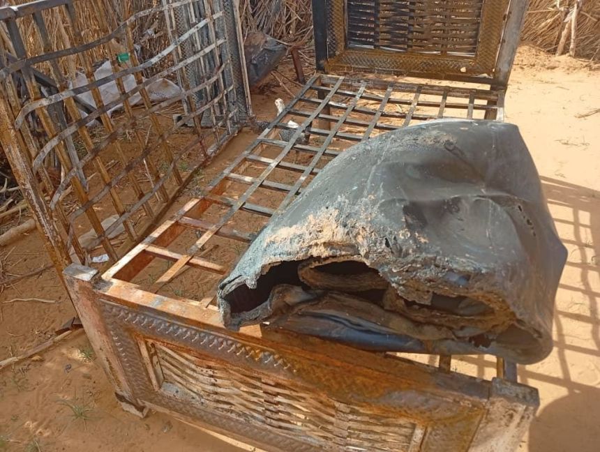 a-burned-mattress-and-bed-frame-among-the-belongings-damaged-when-rehab-s-home-was-destroyed-in-khor-taggat-displacement-camp-in-el-obeid A burned mattress and bed frame among the belongings damaged when Rehab’s home was destroyed in Khor Taggat displacement camp in El-Obeid.