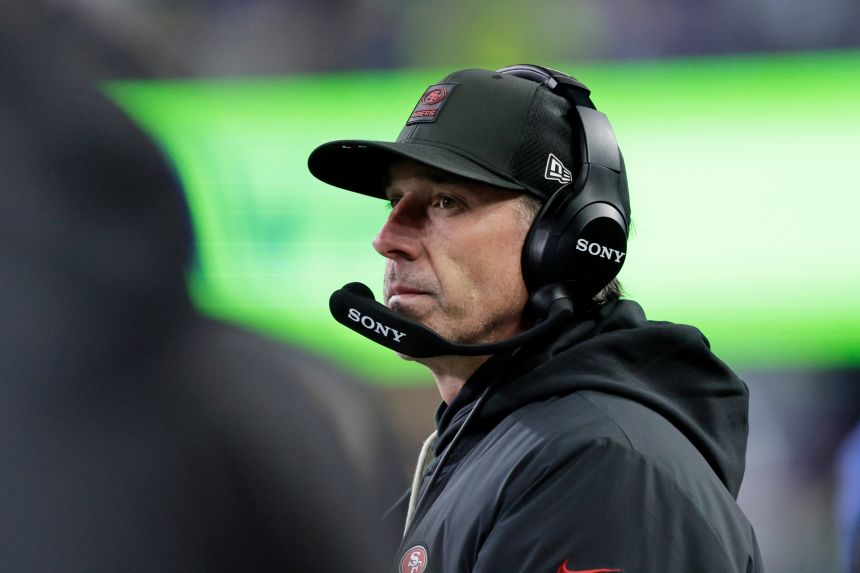 Shanahan looks to the field during the second half of the divisional playoff game against the Seattle Seahawks in January 2026.