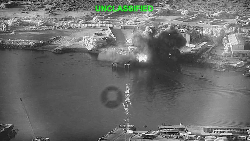 This image from video released by US Central Command shows an explosion caused by US military one-way attack drones at Bandar Abbas Naval Base, Iran, on July 12, 2026.