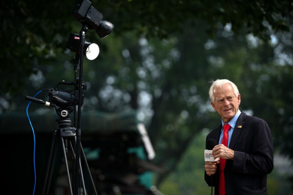 White House trade counselor Peter Navarro prepares for a video interview outside the White House, on July 17.