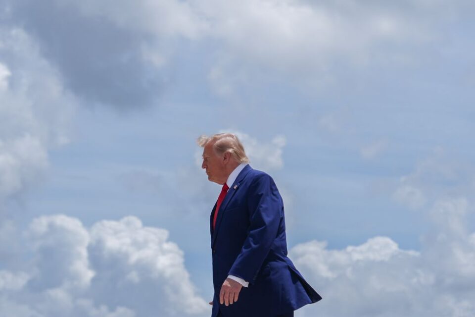 President Donald Trump walks to the presidential limousineafter arriving on Air Force One at Dobbins Air Reserve Base on July 22, in Marietta, Georgia.
