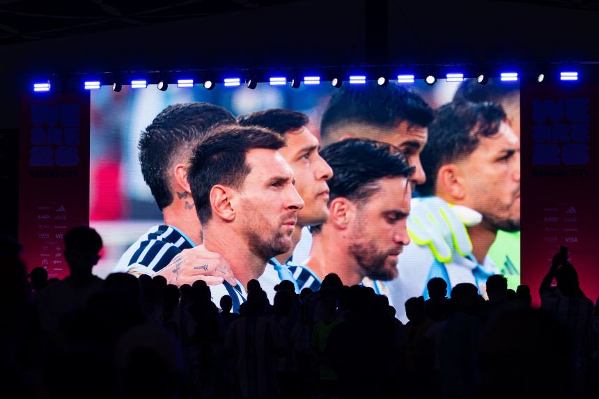 c-gettyimages-2285145161 A giant screen shows Argentina's star forward No. 10 Lionel Messi and other teammates as fans gather at a fan festival to watch the World Cup quarterfinal football match between Argentina and Switzerland in Kansas City, Missouri, on July 11.