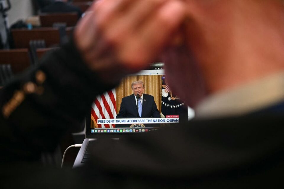 A screen showing US President Donald Trump's July 16 primetime address to the nation is seen in the James S. Brady Press Briefing Room at the White House.