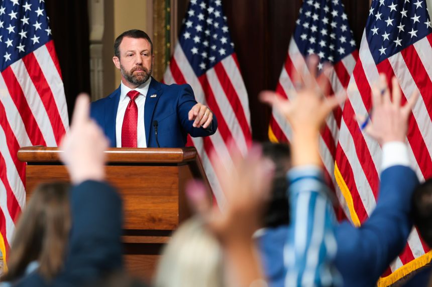 Secretary of Homeland Security Markwayne Mullin speaks during a news conference in the Eisenhower Executive Office Building on July 17.