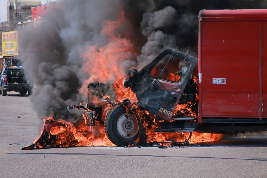 gettyimages-2170693384-20240920202044399 A truck on fire on the streets of Culiacan, Sinaloa state, Mexico, on September 11, 2024, amid an escalation of violence that authorities attribute to internal struggles within the Sinaloa cartel following the capture of its leader, Ismael "Mayo" Zambada.
