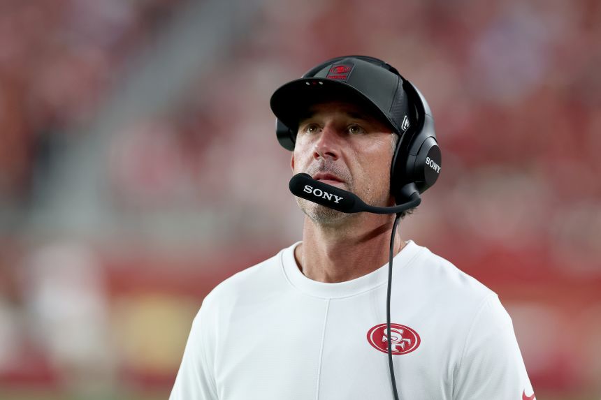 Head coach Kyle Shanahan of the San Francisco 49ers stands on the sidelines during a preseason game in 2025.