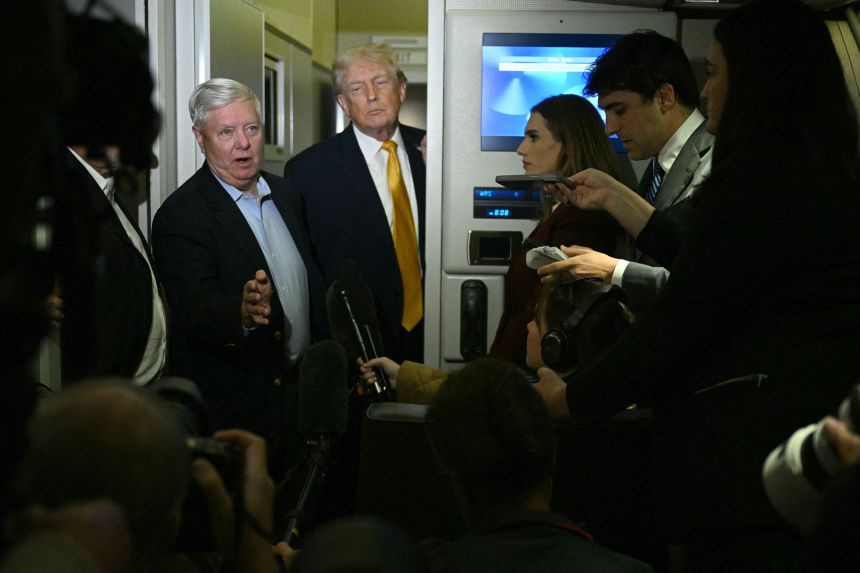 Sen. Lindsey Graham speaks with reporters aboard Air Force One on January 4, 2026.