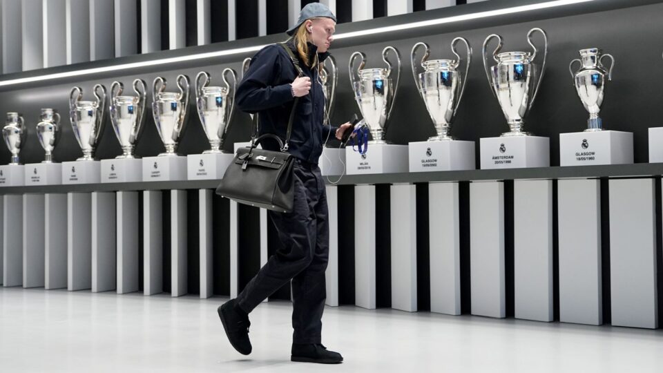 Erling Haaland captured ahead of a UEFA Champions League match between Manchester City and Real Madrid back in March. His enviable collection of luxury handbags has gained him new fans — as well as raised some eyebrows.