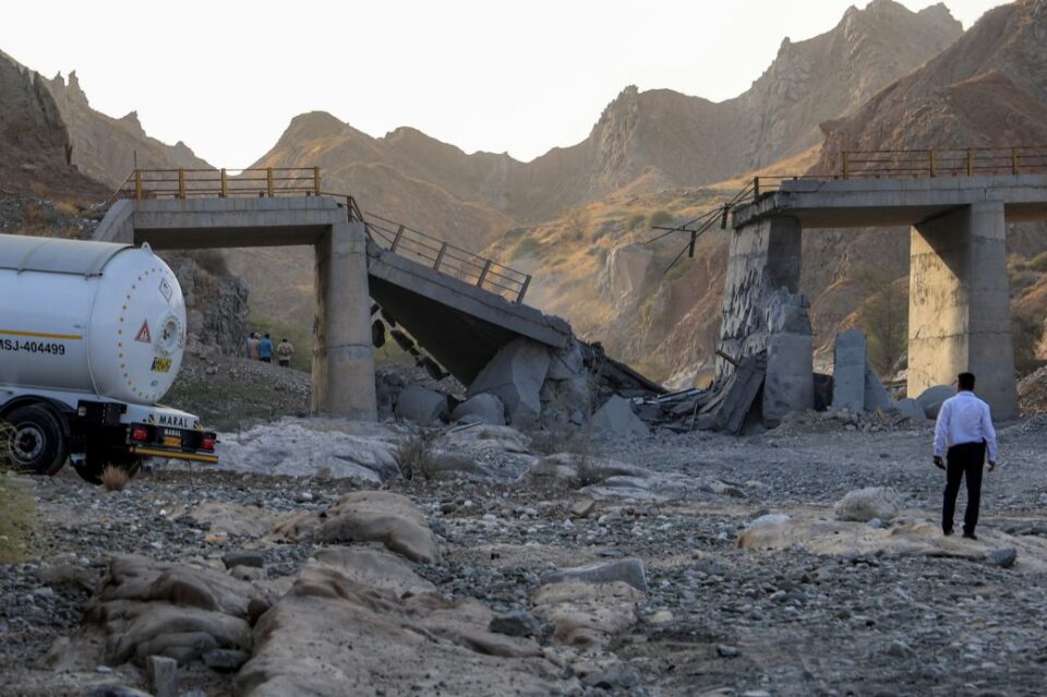 A damaged bridge that was hit by a US strike is pictured along the road connecting Roudan and Bandar Abbas in southern Iran on July 18, 2026.