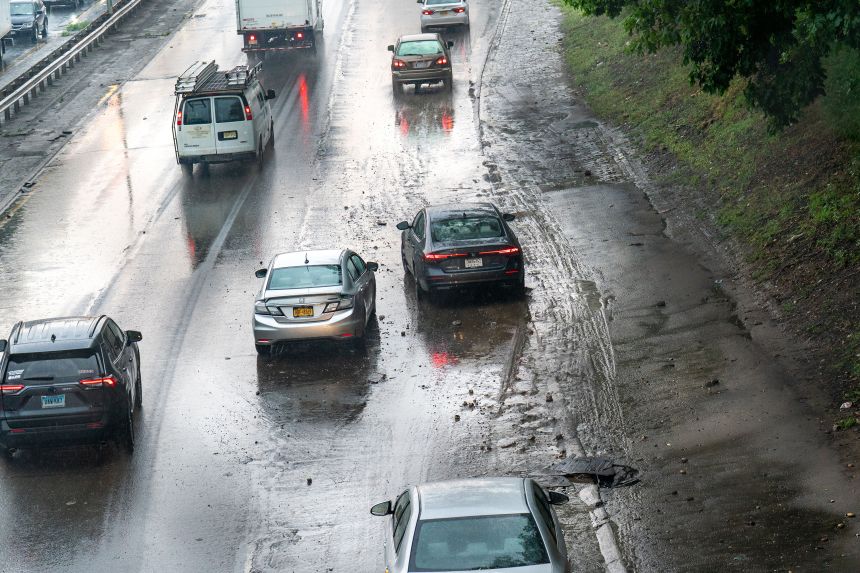 Several cars were disabled on the Clearview Expressway from flash flooding at 48th Avenue as powerful thunderstorms rock New York City on Saturday.