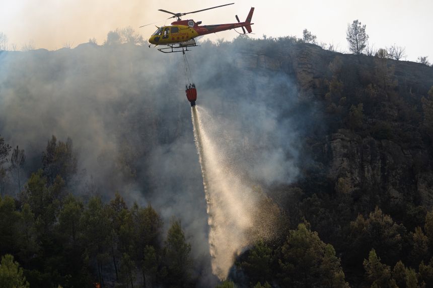gettyimages-2287198141 A helicopter helps the operation on July 22.