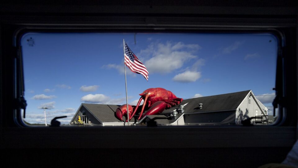 A restaurant in Woolwich, Maine, is seen through a the window of photographer Sarah Silbiger's camper van. She and her partner embarked on a yearlong road trip across the United States and captured the country through the van's window.