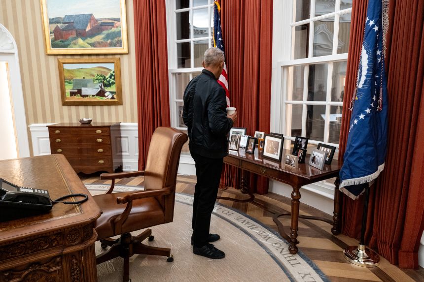 President Obama visiting the walk-in replica of the Oval Office as it appeared during his administration.